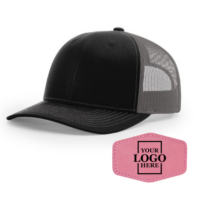 Realtor branded black and charcoal trucker snapback hat with a pink hex patch with black engraving