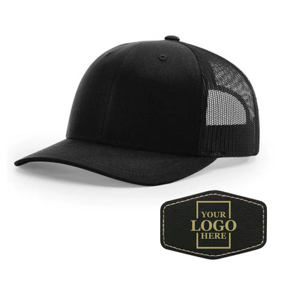 Realtor branded black trucker snapback hat with a black hex patch with gold engraving