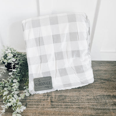 Real estate gift throw blanket in white and gray with leather patch in gray with black engraving