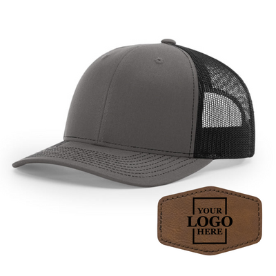 Realtor branded charcoal and black trucker snapback hat with a dark brown hex patch with black engraving