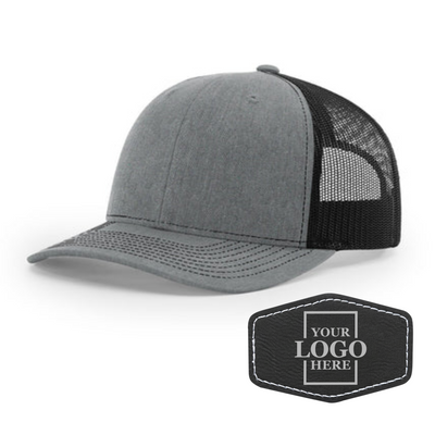 Realtor branded gray and black trucker snapback hat with a black hex patch with silver engraving