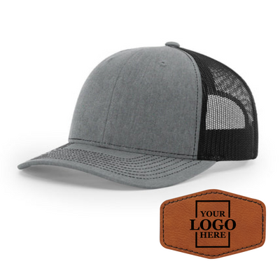 Realtor branded gray and black trucker snapback hat with a rawhide hex patch with black engraving