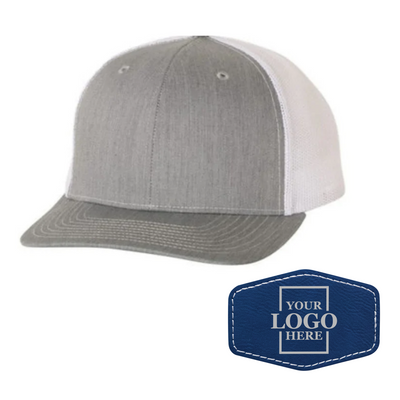 Realtor branded gray and white trucker snapback hat with a blue hex patch with silver engraving