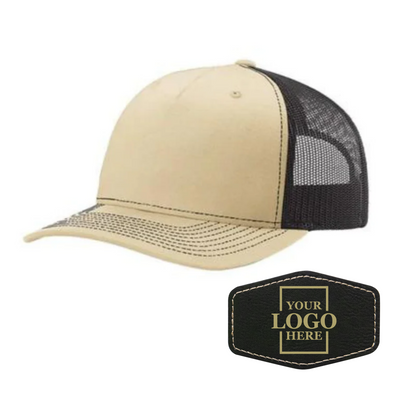 Realtor branded khaki and coffee trucker snapback hat with a black hex patch with gold engraving