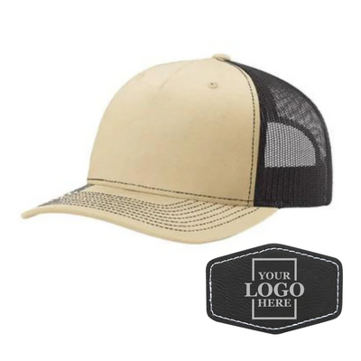Realtor branded khaki and coffee trucker snapback hat with a black hex patch with silver engraving