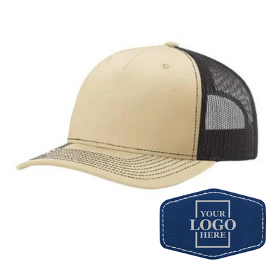 Realtor branded khaki and coffee trucker snapback hat with a blue hex patch with silver engraving