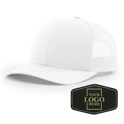 Realtor branded white trucker snapback hat with a black hex patch with gold engraving