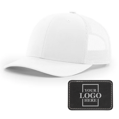 Realtor branded white trucker snapback hat with black rectangle patch with silver engraving