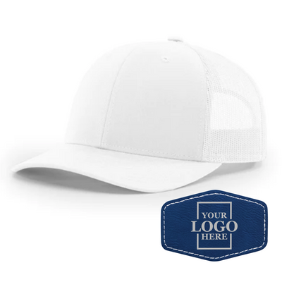 Realtor branded white trucker snapback hat with a blue hex patch with silver engraving