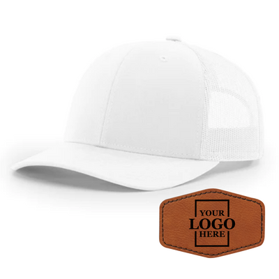 Realtor branded white trucker snapback hat with a rawhide hex patch with black engraving