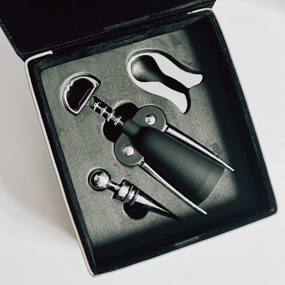 Real estate custom gray 3 piece leatherette wine tool kit with personal logo engraved in black, shown is inside of box 