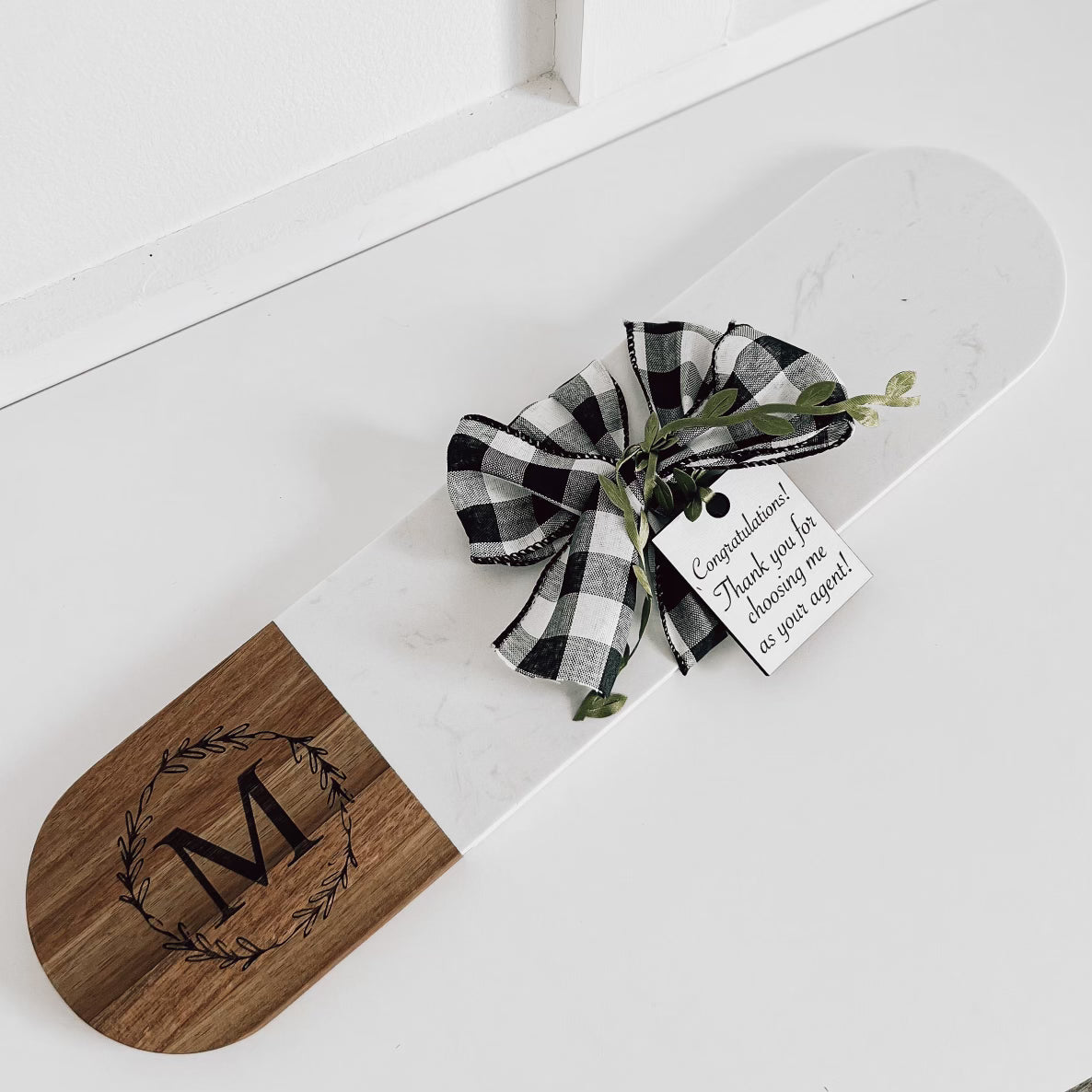 Real Estate Rounded Marble and Acacia Wood board with bow, greenery and a standard tag
