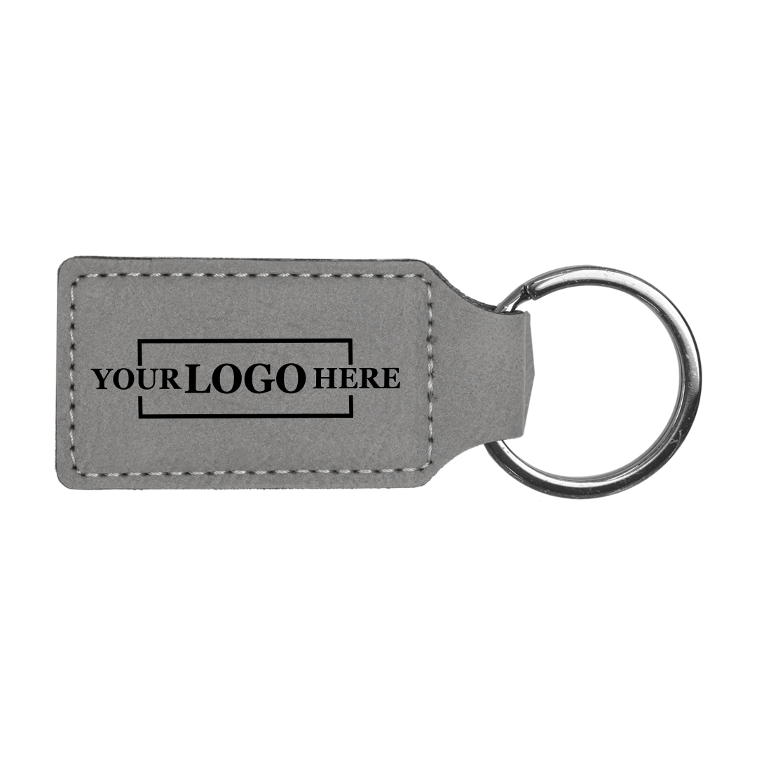 Realtor promotional gray branded leatherette keychains with black engraving, shown horizontally