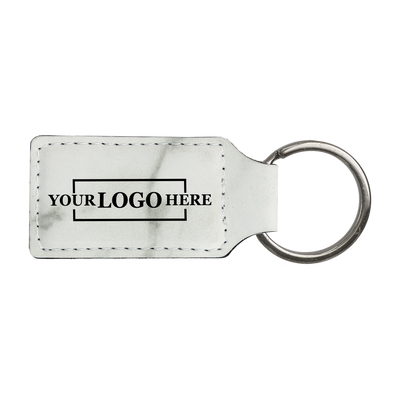 Realtor promotional marble branded leatherette keychains with black engraving, shown horizontally
