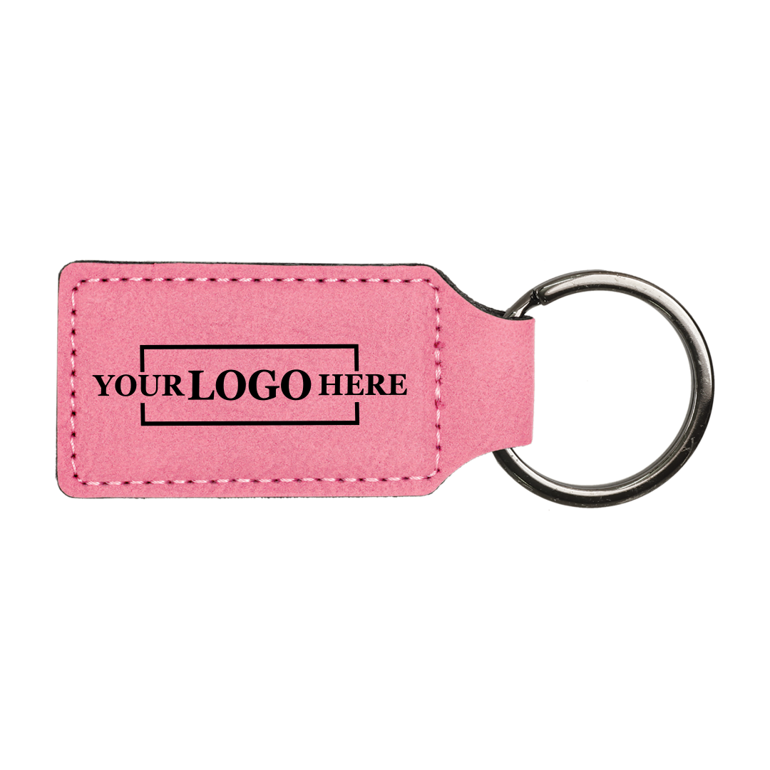 Realtor promotional pink branded leatherette keychains with black engraving, shown horizontally