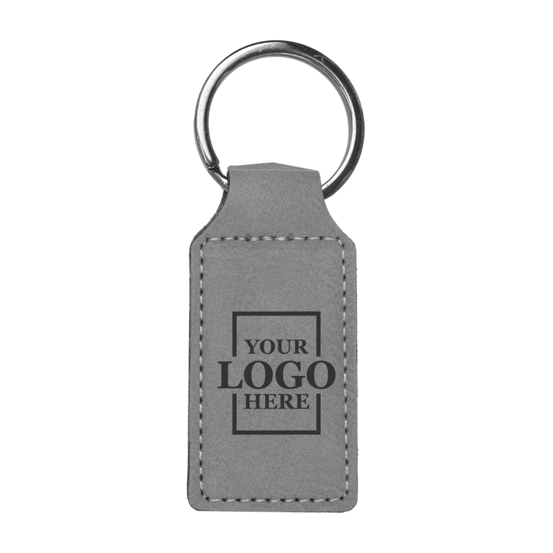 Realtor promotional gray branded leatherette keychains with black engraving, shown vertically