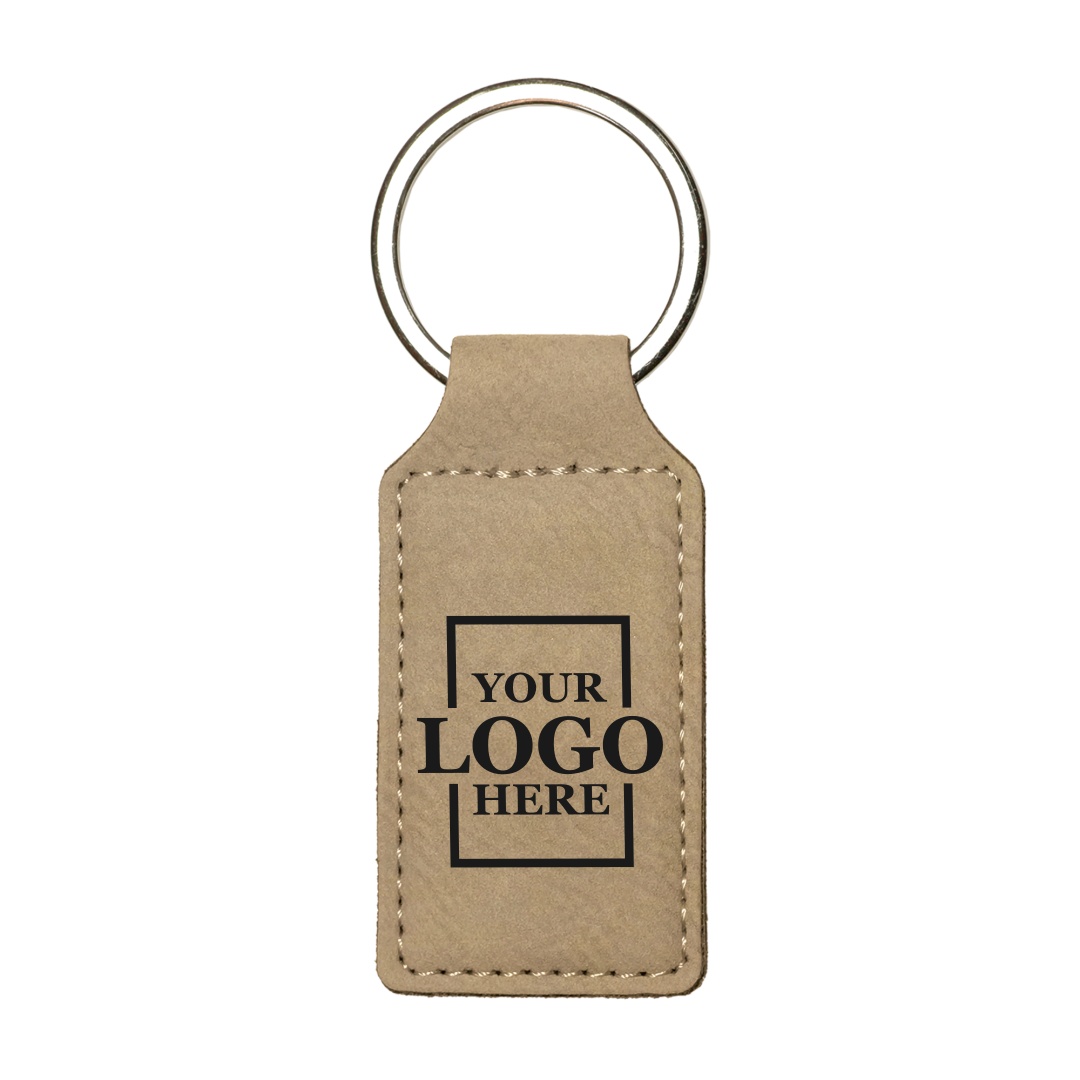 Realtor promotional light brown branded leatherette keychains with black engraving, shown vertically