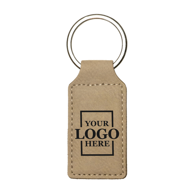 Realtor promotional light brown branded leatherette keychains with black engraving, shown vertically