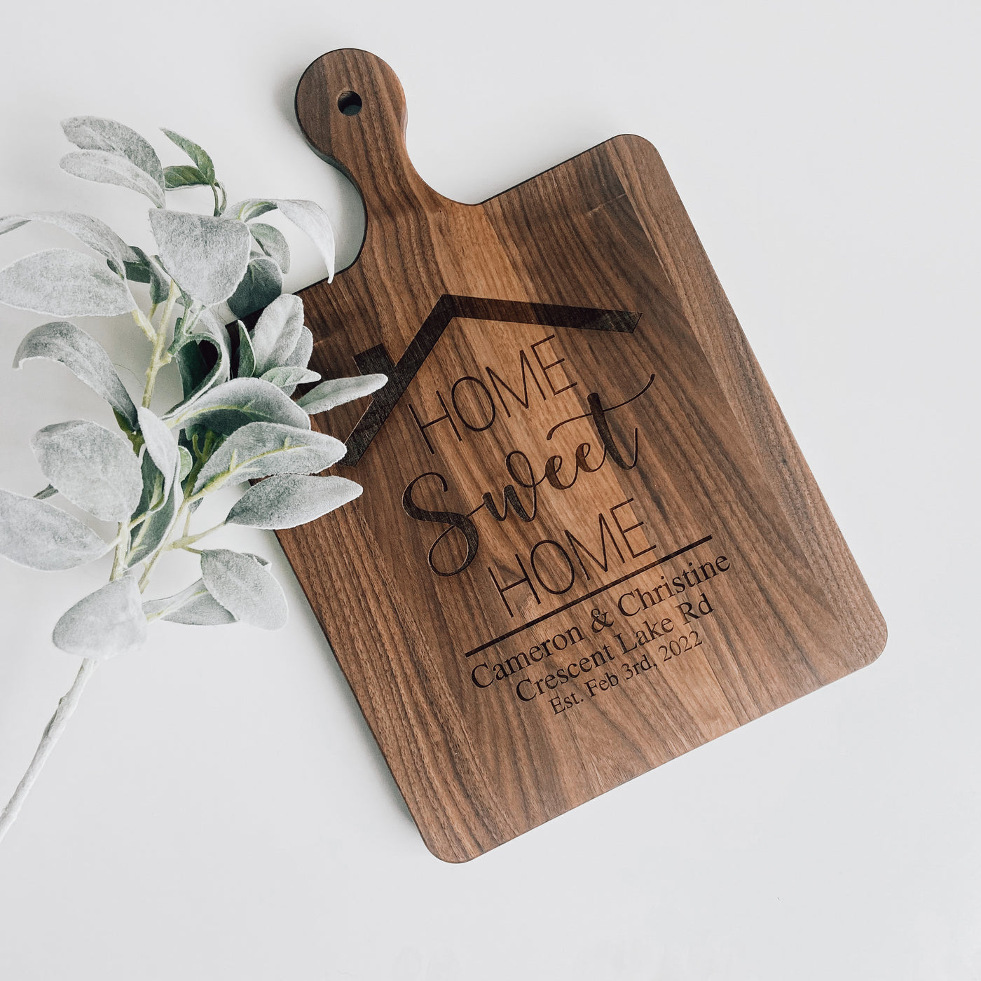 Real estate gift of a large walnut paddle cutting board with home sweet home design 1 choice