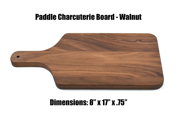 Real estate gift of a large walnut paddle cutting board 