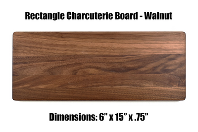 Real estate gift of a long walnut rectangle cutting board 