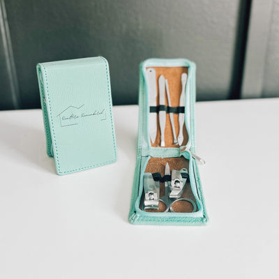 Realtor promotional gift leatherette manicure set in teal with black engraving, showing inside and outside