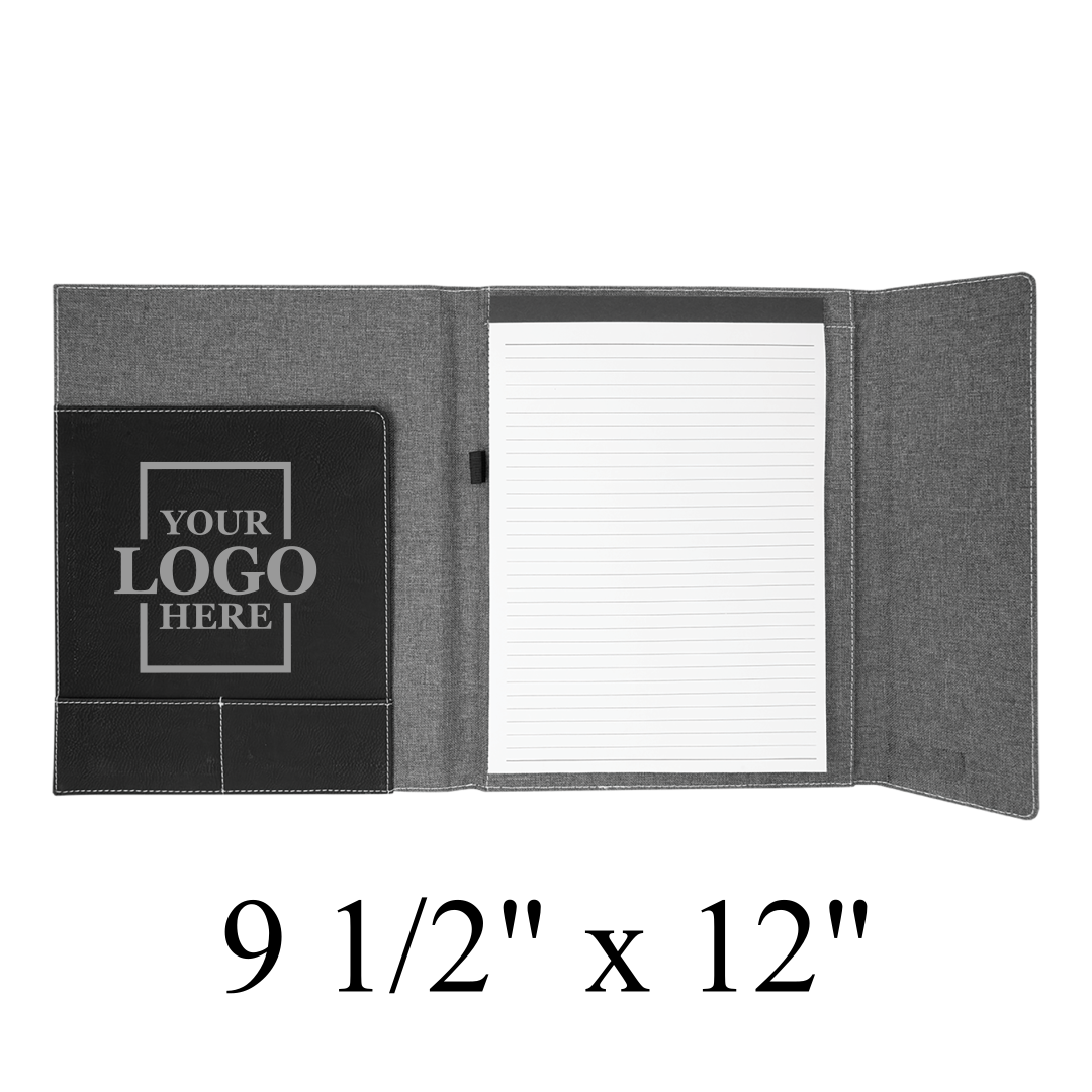 Real estate promotional gift of black and gray leatherette and canvas portfolio with notepad engraved with silver, showing inside