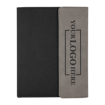 Real estate promotional gift of gray and black leatherette and canvas portfolio with notepad engraved with black 