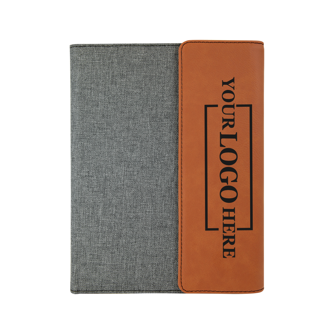 Real estate promotional gift of a gray and rawhide leatherette portfolio with notepad engraved with black