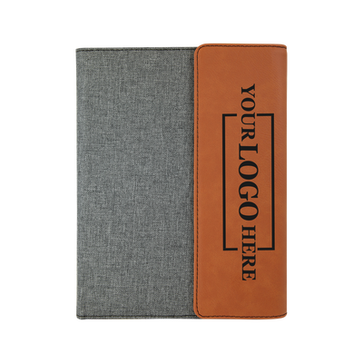 Real estate promotional gift of a gray and rawhide leatherette portfolio with notepad engraved with black