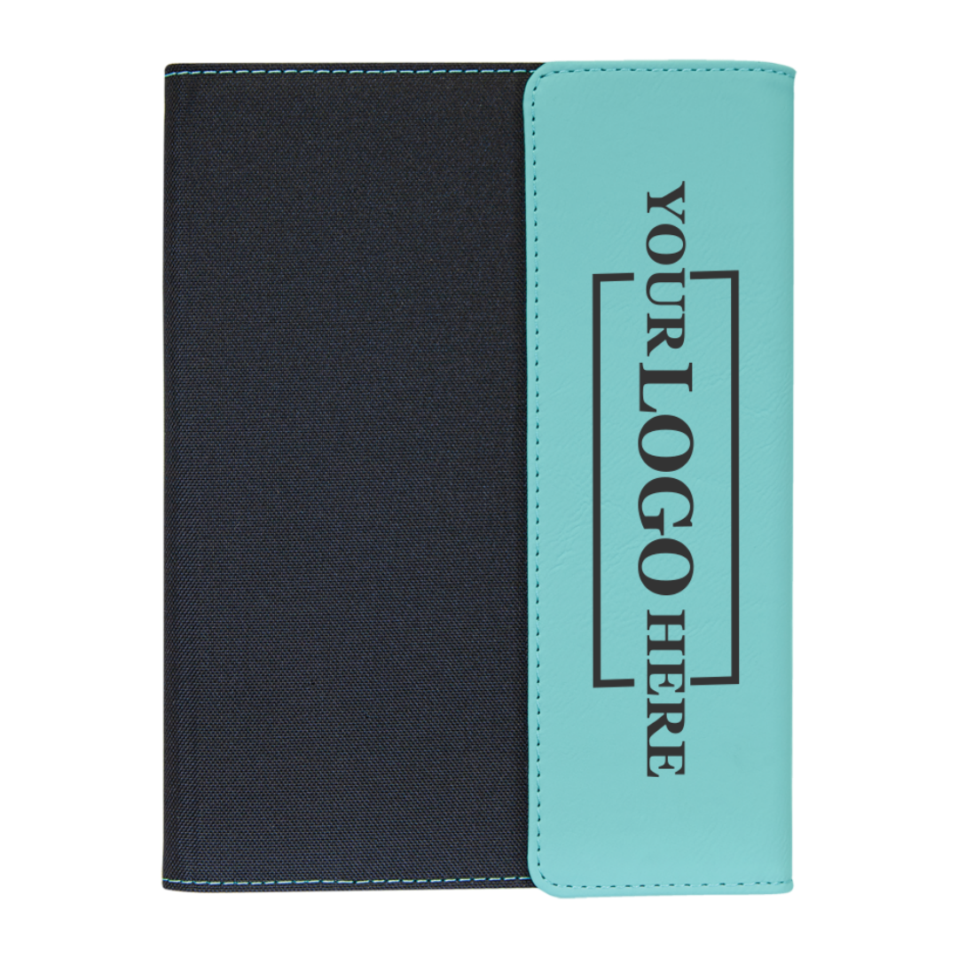 Real estate promotional gift of teal and black leatherette and canvas portfolio with notepad engraved with black 