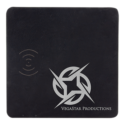 Real estate promotional gift of a black branded leatherette wireless charging mat engraved in silver