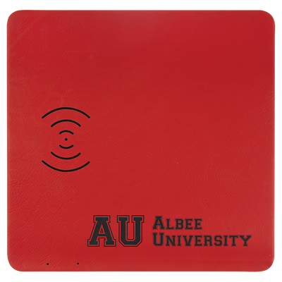 Real estate promotional gift of a red branded leatherette wireless charging mat engraved in black 